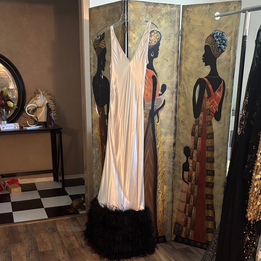 Elegant White Gown with Black Feather Hem